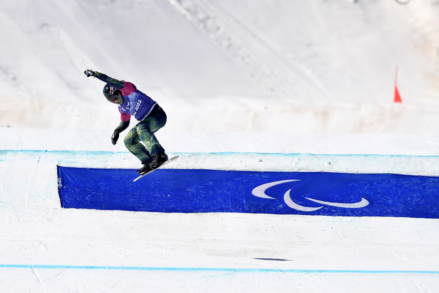 Para-snowboarder competing at the Beijing 2022 Paralympic Winter Games.