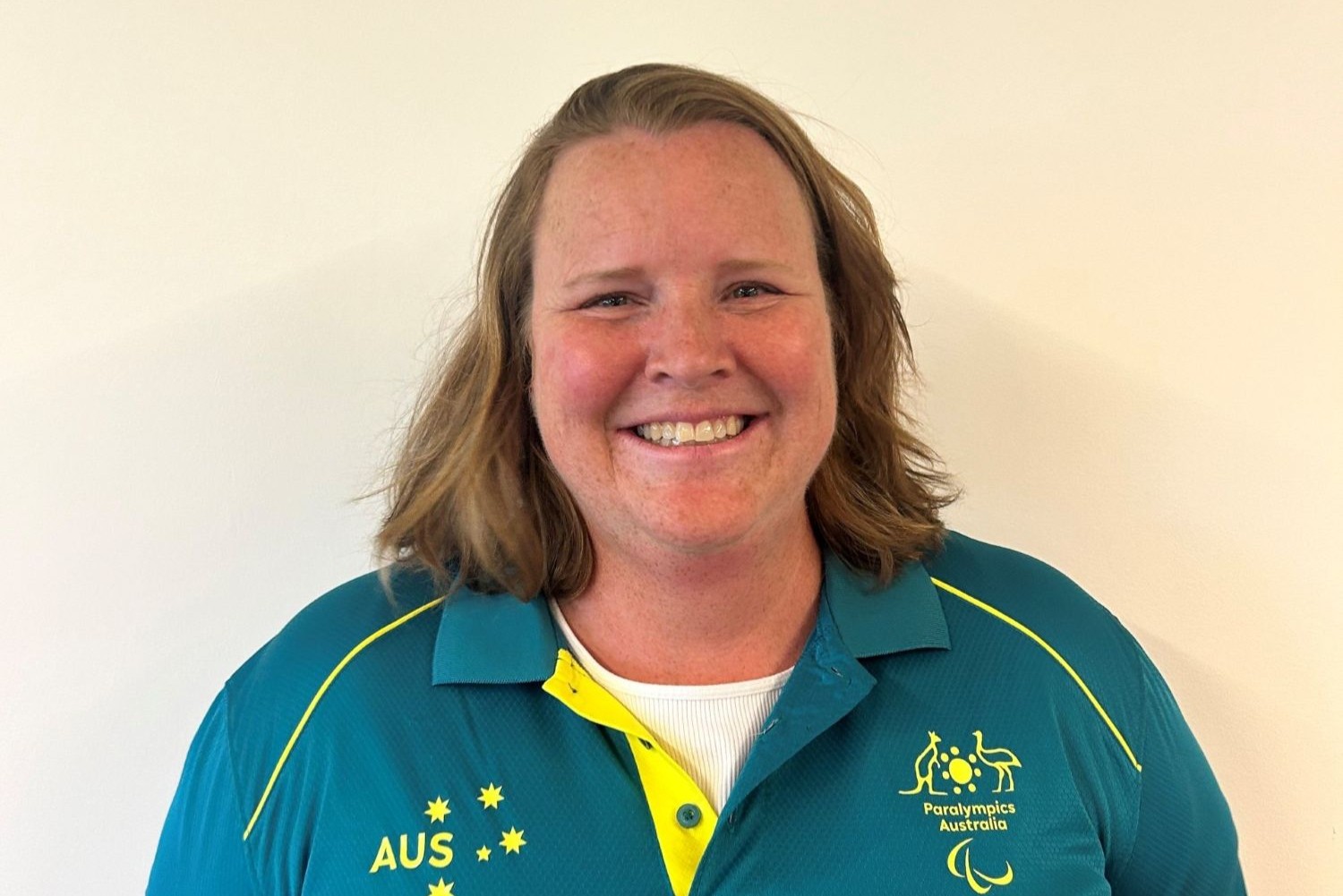 New Para Uplift Recruitment Lead Jenn Brown smiles at the camera. 